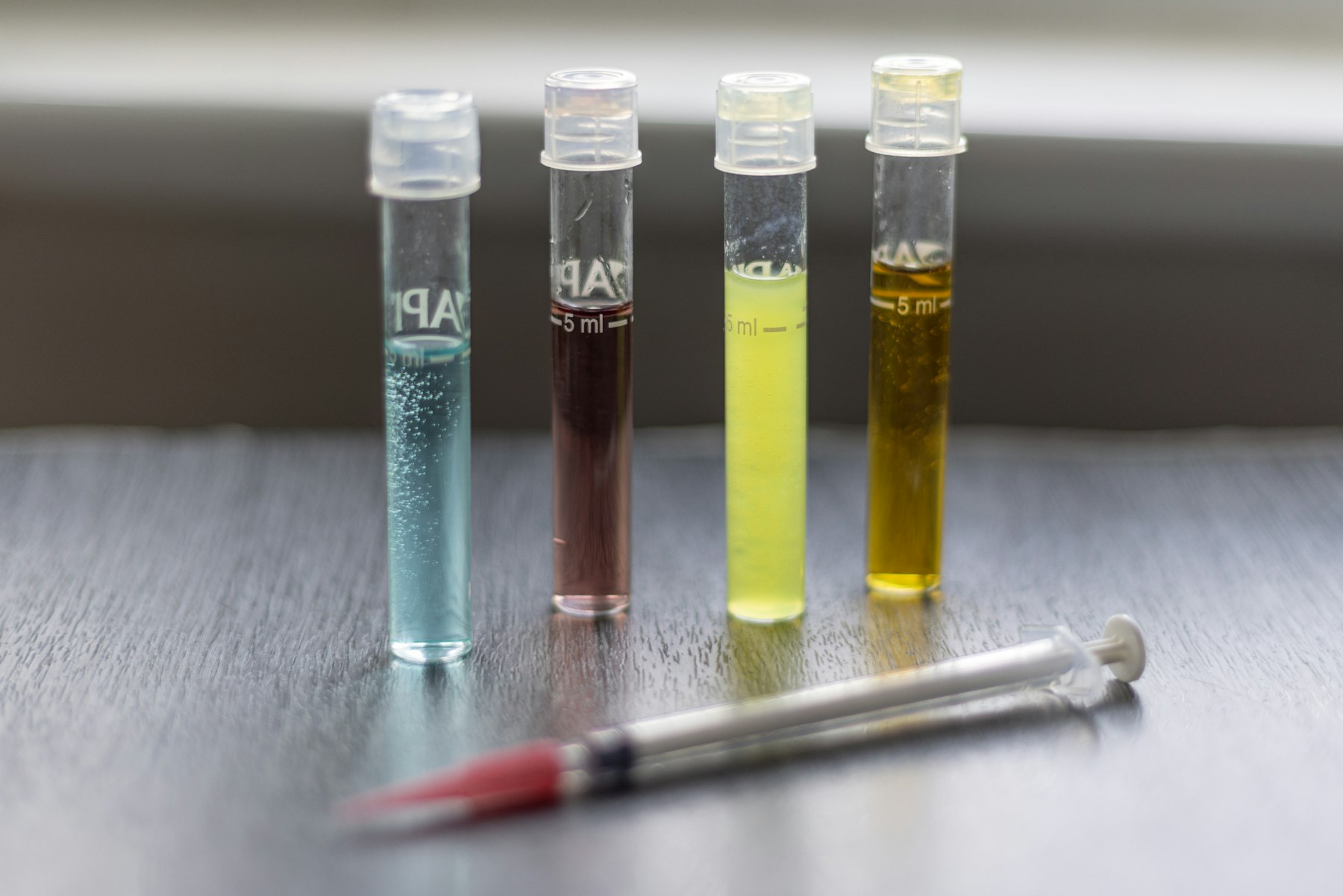 Colorful test tubes in a laboratory setting